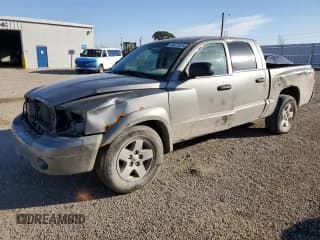 ✅ 2007 Dodge Dakota SLT • VIN: 1D7HW48P67S163931 • Lot: 92477675. Listed on Copart with 206,626 mi. Free auction sales archive from the USA and detailed vehicle history report at DreamBid. Image 1.