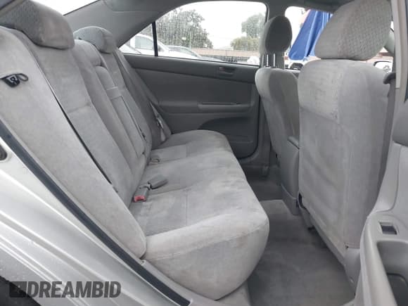 ✅ 2002 Toyota Camry LE • VIN: JTDBE32KX20094109 • Лот: 43704420. Опубликован ранее на IAAI с пробегом 164 801 миль. Бесплатный доступ к архиву аукционных продаж из США и подробный отчёт об истории автомобиля на DreamBid. Изображение 8.