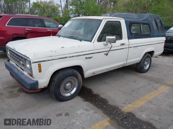 ✅ 1985 Ford Ranger S • VIN: 1FTCR10S8FUA23702 • Lot: 42017521. Wystawiony na IAAI z przebiegiem 12 320 mil. Bezpłatny archiwum sprzedaży aukcyjnych z USA i szczegółowy raport historii pojazdu na DreamBid. Zdjęcie 2.
