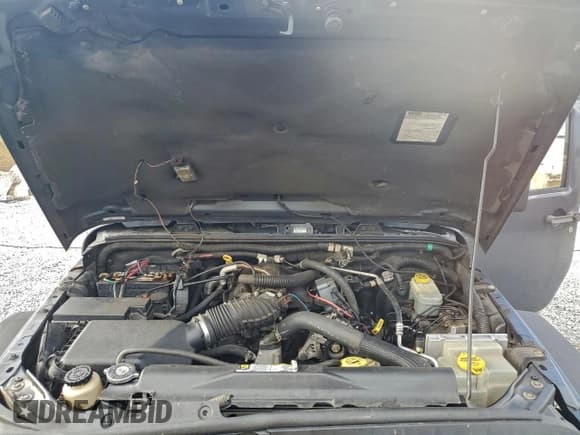 ✅ 2007 Jeep Wrangler X • VIN: 1J4FA24177L103988 • Лот: 93502485. Опубликован ранее на Copart с пробегом 219 924 миль. Бесплатный доступ к архиву аукционных продаж из США и подробный отчёт об истории автомобиля на DreamBid. Изображение 11.