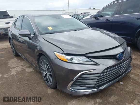 2022 Toyota Camry Hybrid XLE with VIN 4T1F31AK0NU589375, listed as a IAAI auction lot 42600441 with 28,781 mi miles and . Bid and sale history available at DreamBid. Image 1.