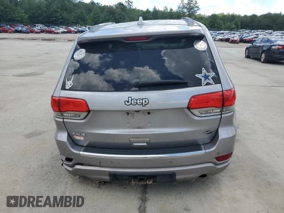 ✅ 2014 Jeep Grand Cherokee Overland • VIN: 1C4RJFCG5EC210163 • Lot: 68894775. Listed on Copart with 205,339 mi. Free auction sales archive from the USA and detailed vehicle history report at DreamBid. Image 6.