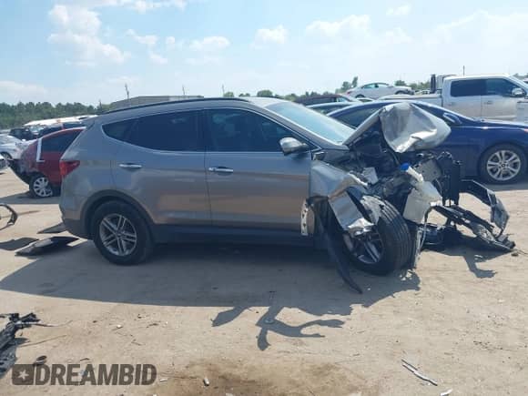 2018 Hyundai Santa Fe 2.4L z VIN 5NMZUDLB1JH065408, wystawiony jako IAAI lot #43342396 z przebiegiem 113 154 mil mil oraz . Historia ofert i sprzedaży dostępna na DreamBid. Obrazek 13.