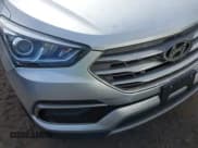 ✅ 2017 Hyundai Santa Fe 2.4L • VIN: 5XYZTDLB2HG428225 • Лот: 41621569. Опубликован ранее на IAAI с пробегом Не указан. Бесплатный доступ к архиву аукционных продаж из США и подробный отчёт об истории автомобиля на DreamBid. Изображение 6.