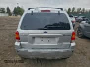 ✅ 2006 Ford Escape Hybrid • VIN: 1FMCU95H06KA31102 • Lot: 96157245. Listed on Copart with 161,532 mi. Free auction sales archive from the USA and detailed vehicle history report at DreamBid. Image 6.