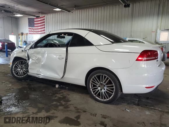 ✅ 2012 Volkswagen Eos Lux • VIN: WVWFW7AH9CV004299 • Лот: 69102645. Опубликован ранее на Copart с пробегом 139 516 миль. Бесплатный доступ к архиву аукционных продаж из США и подробный отчёт об истории автомобиля на DreamBid. Изображение 2.