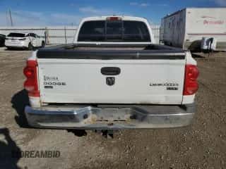 2010 Dodge Dakota Laramie z VIN 1D7CW5GP3AS140020, wystawiony jako Copart lot #76813194 z przebiegiem Nie podano mil oraz Szkoda całkowita • Salvage title. Historia ofert i sprzedaży dostępna na DreamBid. Obrazek 6.