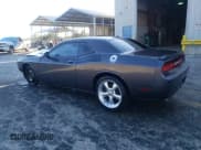 ✅ 2013 Dodge Challenger R/T Plus • VIN: 2C3CDYBT6DH646771 • Lot: 81591064. Wystawiony na Copart z przebiegiem 142 740 mil. Bezpłatny archiwum sprzedaży aukcyjnych z USA i szczegółowy raport historii pojazdu na DreamBid. Zdjęcie 2.