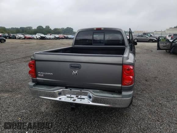 2006 Dodge Dakota SLT z VIN 1D7HE48K36S656505, wystawiony jako Copart lot #72613124 z przebiegiem 71 075 mil mil oraz Szkoda całkowita • Salvage title. Historia ofert i sprzedaży dostępna na DreamBid. Obrazek 6.