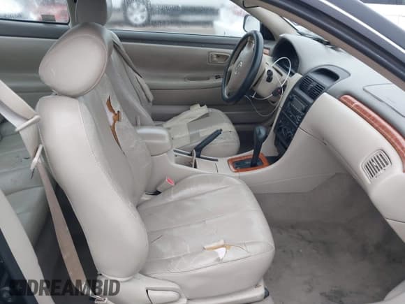 ✅ 2002 Toyota Solara SE • VIN: 2T1CE22P22C000370 • Lot: 41528835. Listed on IAAI with 215,628 mi. Free auction sales archive from the USA and detailed vehicle history report at DreamBid. Image 5.