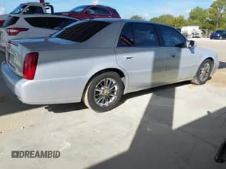 ✅ 2005 Cadillac DeVille DTS • VIN: 1G6KF57915U211283 • Lot: 43810647. Listed on IAAI with 92,860 mi. Free auction sales archive from the USA and detailed vehicle history report at DreamBid. Image 4.