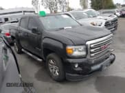 ✅ 2015 GMC Canyon 2WD SLE • VIN: 1GTG5BE33F1267652 • Lot: 42239511. Wystawiony na IAAI z przebiegiem 164 681 mil. Bezpłatny archiwum sprzedaży aukcyjnych z USA i szczegółowy raport historii pojazdu na DreamBid. Zdjęcie 1.