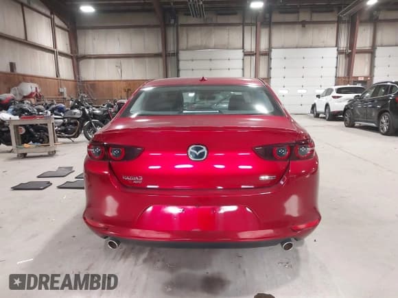✅ 2021 Mazda 3 • VIN: JM1BPBDL0M1334811 • Lot: 43777630. Listed on IAAI with 57,584 mi. Free auction sales archive from the USA and detailed vehicle history report at DreamBid. Image 17.