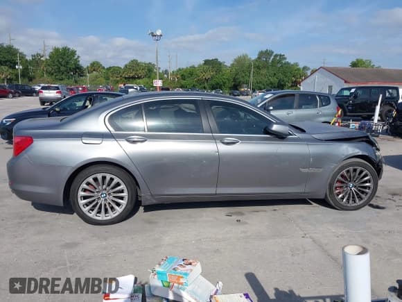 ✅ 2012 BMW 7 Series 740i • VIN: WBAKA4C52CDS99456 • Lot: 42104455. Listed on IAAI with 135,817 mi. Free auction sales archive from the USA and detailed vehicle history report at DreamBid. Image 14.