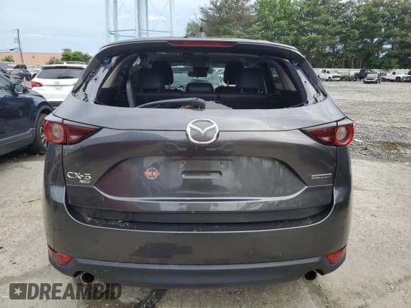✅ 2021 Mazda CX-5 Carbon Edition • VIN: JM3KFBCM2M0495767 • Лот: 63180775. Опубликован ранее на Copart с пробегом 42 167 миль. Бесплатный доступ к архиву аукционных продаж из США и подробный отчёт об истории автомобиля на DreamBid. Изображение 6.