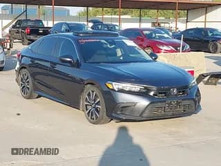 ✅ 2022 Honda Civic EX • VIN: 2HGFE1F73NH311660 • Lot: 43165014. Listed on IAAI with 59,699 mi. Free auction sales archive from the USA and detailed vehicle history report at DreamBid. Image 1.