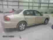 2003 Chevrolet Malibu LS z VIN 1G1NE52J03M675783, wystawiony jako Copart lot #83032764 z przebiegiem 185 343 mil mil oraz Nie do naprawy • Non repairable. Historia ofert i sprzedaży dostępna na DreamBid. Obrazek 3.