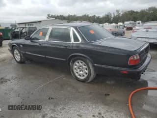 ✅ 2003 Jaguar XJ 8 • VIN: SAJDA14C93LF51026 • Лот: 83897794. Опубликован ранее на Copart с пробегом 50 945 миль. Бесплатный доступ к архиву аукционных продаж из США и подробный отчёт об истории автомобиля на DreamBid. Изображение 2.