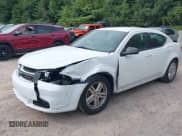 ✅ 2012 Dodge Avenger SE • VIN: 1C3CDZAB1CN310501 • Lot: 43096260. Listed on IAAI with 151,434 mi. Free auction sales archive from the USA and detailed vehicle history report at DreamBid. Image 2.