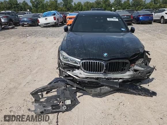 ✅ 2016 BMW 7 Series 750i • VIN: WBA7F0C53GGL99358 • Lot: 80313835. Listed on Copart with 87,729 mi. Free auction sales archive from the USA and detailed vehicle history report at DreamBid. Image 14.