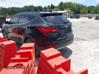 2015 Hyundai Santa Fe z VIN 5XYZU3LB2FG245007, wystawiony jako IAAI lot #42912026 z przebiegiem 54 476 mil mil oraz . Historia ofert i sprzedaży dostępna na DreamBid. Obrazek 3.