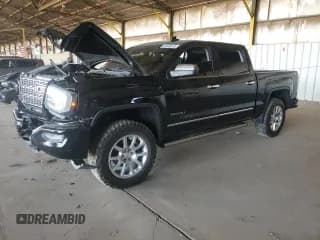✅ 2018 GMC Sierra 1500 Denali • VIN: 3GTP1PEJ4JG252143 • Lot: 67643215. Listed on Copart with 102,742 mi. Free auction sales archive from the USA and detailed vehicle history report at DreamBid. Image 1.