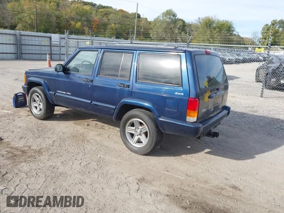 ✅ 2001 Jeep Cherokee Sport • VIN: 1J4FF58S71L502445 • Lot: 43548532. Listed on IAAI with 284,990 mi. Free auction sales archive from the USA and detailed vehicle history report at DreamBid. Image 3.