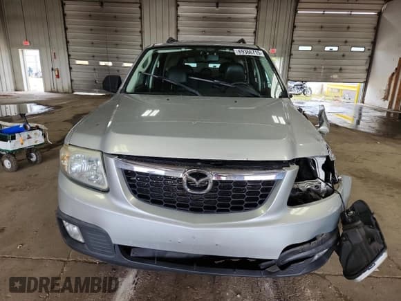 ✅ 2009 Mazda Tribute Sport • VIN: 4F2CZ02719KM00096 • Lot: 69366715. Listed on Copart with 218,101 mi. Free auction sales archive from the USA and detailed vehicle history report at DreamBid. Image 5.
