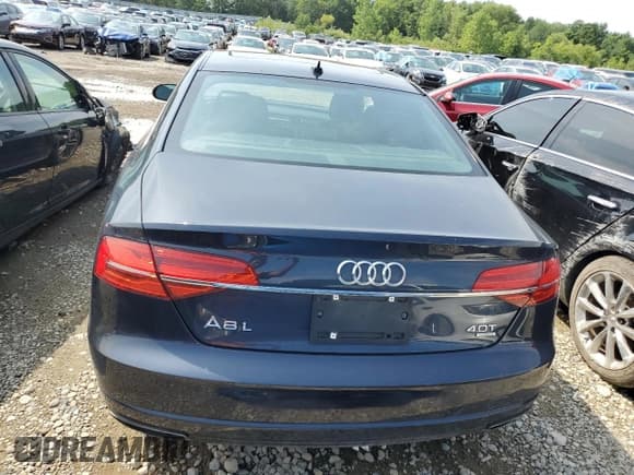 ✅ 2016 Audi A8 Sport • VIN: WAU43AFD4GN021405 • Лот: 63458465. Опубликован ранее на Copart с пробегом 189 594 миль. Бесплатный доступ к архиву аукционных продаж из США и подробный отчёт об истории автомобиля на DreamBid. Изображение 6.