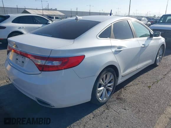 2012 Hyundai Azera z VIN KMHFG4JG5CA152696, wystawiony jako IAAI lot #42009308 z przebiegiem 133 068 mil mil oraz . Historia ofert i sprzedaży dostępna na DreamBid. Obrazek 4.