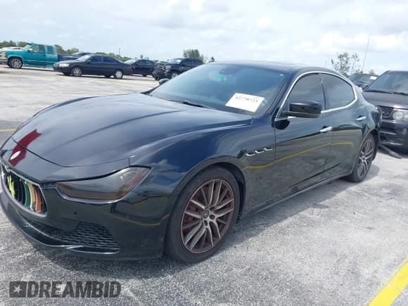✅ 2015 Maserati Ghibli • VIN: ZAM57XSA1F1144073 • Lot: 42770723. Listed on IAAI with 105,782 mi. Free auction sales archive from the USA and detailed vehicle history report at DreamBid. Image 2.