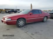 ✅ 1998 Cadillac Eldorado Touring • VIN: 1G6ET1291WU601906 • Лот: 84911624. Опубликован ранее на Copart с пробегом 84 489 миль. Бесплатный доступ к архиву аукционных продаж из США и подробный отчёт об истории автомобиля на DreamBid. Изображение 1.
