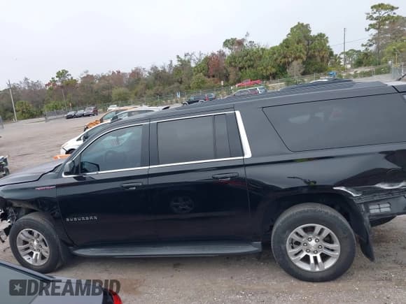 ✅ 2017 Chevrolet Suburban LS • VIN: 1GNSCGKC4HR289284 • Lot: 41503869. Listed on IAAI with 92,048 mi. Free auction sales archive from the USA and detailed vehicle history report at DreamBid. Image 14.