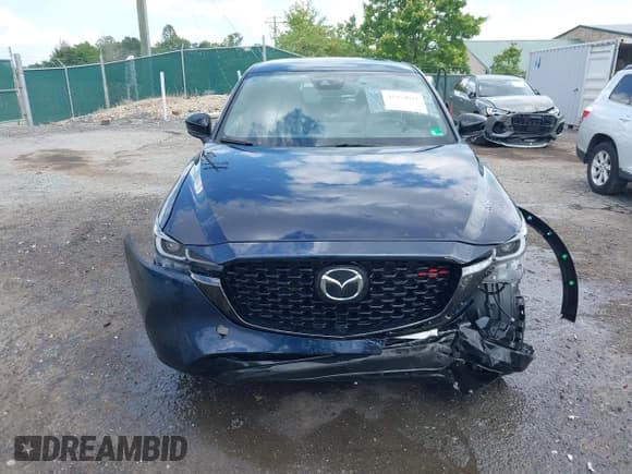 ✅ 2023 Mazda CX-5 2.5 Turbo • VIN: JM3KFBAY6P0246012 • Lot: 42454012. Wystawiony na IAAI z przebiegiem 7 043 mil. Bezpłatny archiwum sprzedaży aukcyjnych z USA i szczegółowy raport historii pojazdu na DreamBid. Zdjęcie 6.