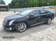 ✅ 2014 Cadillac XTS Premium • VIN: 2G61R5S38E9315286 • Лот: 57211545. Опубликован ранее на Copart с пробегом 147 539 миль. Бесплатный доступ к архиву аукционных продаж из США и подробный отчёт об истории автомобиля на DreamBid. Изображение 1.