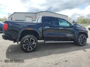 ✅ 2023 GMC Canyon 4WD Denali • VIN: 1GTP6FEK4P1264708 • Лот: 55852315. Опубликован ранее на Copart с пробегом 5 037 миль. Бесплатный доступ к архиву аукционных продаж из США и подробный отчёт об истории автомобиля на DreamBid. Изображение 3.