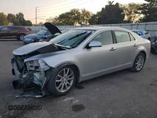 2012 Chevrolet Malibu LTZ with VIN 1G1ZG5E79CF165898, listed as a Copart auction lot 80611505 with 159,645 mi miles and Salvage title. Bid and sale history available at DreamBid. Image 1.