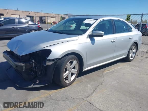 ✅ 2015 Volkswagen Passat S • VIN: 1VWAT7A35FC083250 • Lot: 43381930. Listed on IAAI with 125,250 mi. Free auction sales archive from the USA and detailed vehicle history report at DreamBid. Image 2.