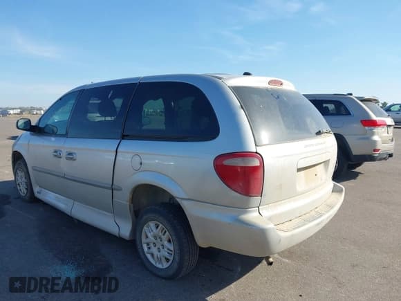 ✅ 2001 Dodge Caravan Sport • VIN: 2B4GP44331R419907 • Lot: 43352503. Listed on IAAI with 156,037 mi. Free auction sales archive from the USA and detailed vehicle history report at DreamBid. Image 3.