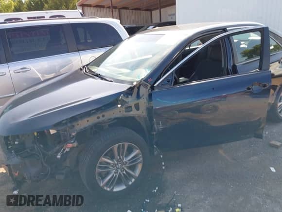 2016 Toyota Camry SE with VIN 4T1BF1FKXGU590308, listed as a IAAI auction lot 43253552 with 144,700 mi miles and . Bid and sale history available at DreamBid. Image 6.