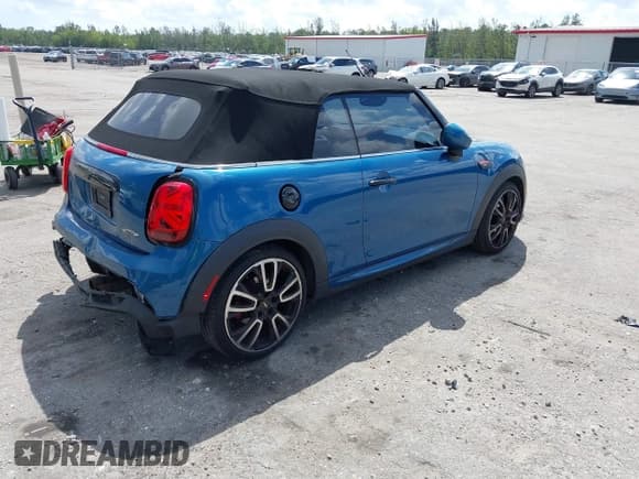 ✅ 2022 MINI Convertible John Cooper Works • VIN: WMW63DL0XN3P15732 • Lot: 41807134. Listed on IAAI with 52,631 mi. Free auction sales archive from the USA and detailed vehicle history report at DreamBid. Image 4.