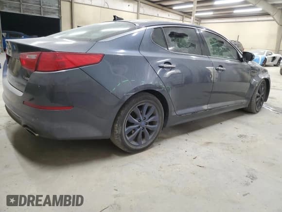 ✅ 2015 Kia Optima EX • VIN: 5XXGN4A73FG441695 • Лот: 92420375. Опубликован ранее на Copart с пробегом 213 747 миль. Бесплатный доступ к архиву аукционных продаж из США и подробный отчёт об истории автомобиля на DreamBid. Изображение 3.