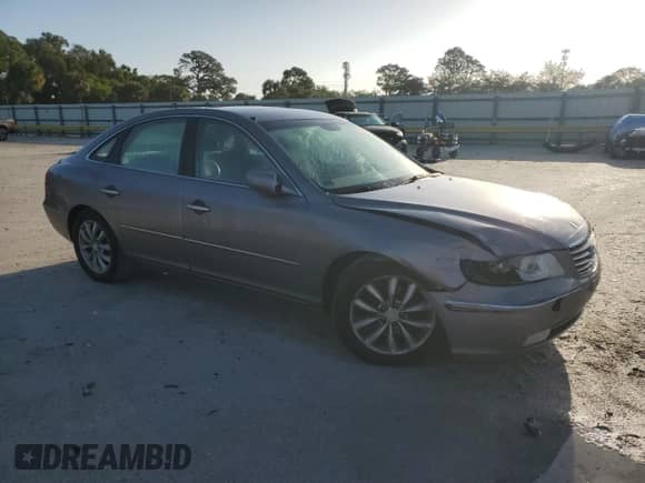 2006 Hyundai Azera SE с VIN KMHFC46F96A118552, выставлен на аукционе Copart как лот 50934395 с пробегом 122 210 миль миль и Списание • Salvage title. История ставок и продаж доступна на DreamBid. Изображение 4.