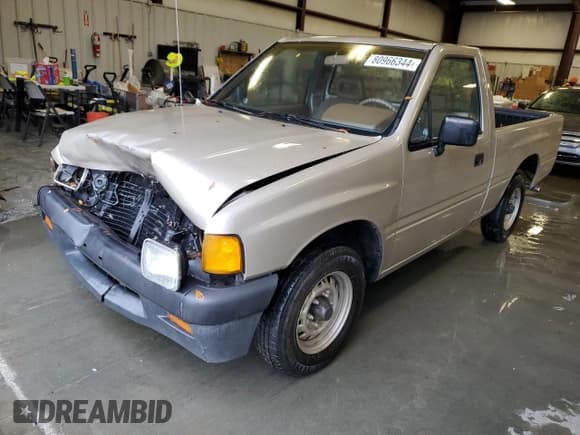 ✅ 1992 Isuzu Pickup S • VIN: 4S1CL11L0N4208813 • Лот: 80966344. Опубликован ранее на Copart с пробегом 166 056 миль. Бесплатный доступ к архиву аукционных продаж из США и подробный отчёт об истории автомобиля на DreamBid. Изображение 1.
