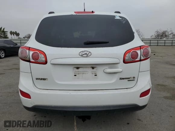 ✅ 2011 Hyundai Santa Fe GLS • VIN: 5XYZGDAB7BG017773 • Lot: 85688774. Listed on Copart with 196,456 mi. Free auction sales archive from the USA and detailed vehicle history report at DreamBid. Image 6.