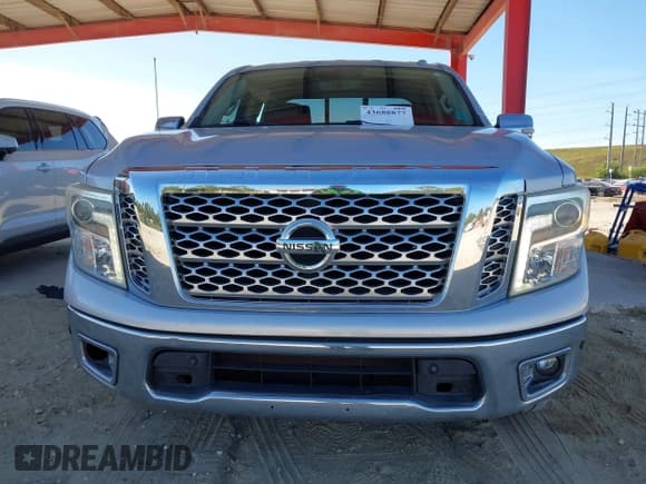 ✅ 2017 Nissan Titan Platinum Reserve • VIN: 1N6AA1E68HN542396 • Lot: 43688877. Listed on IAAI with 124,644 mi. Free auction sales archive from the USA and detailed vehicle history report at DreamBid. Image 12.