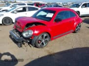 ✅ 2014 Volkswagen Beetle Entry • VIN: 3VWFP7AT6EM627973 • Lot: 42100800. Listed on IAAI with 160,694 mi. Free auction sales archive from the USA and detailed vehicle history report at DreamBid. Image 2.