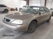 ✅ 2002 Mercury Sable GS • VIN: 1MEFM50U62G621153 • Lot: 42127554. Listed on IAAI with 159,053 mi. Free auction sales archive from the USA and detailed vehicle history report at DreamBid. Image 2.