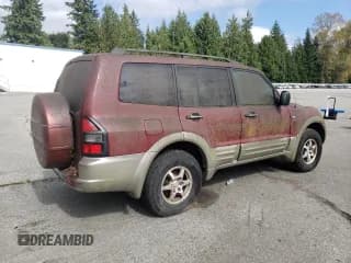 ✅ 2002 Mitsubishi Montero XLS • VIN: JA4MW31R52J069014 • Лот: 71785804. Опубликован ранее на Copart с пробегом Не указан. Бесплатный доступ к архиву аукционных продаж из США и подробный отчёт об истории автомобиля на DreamBid. Изображение 3.