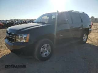 2011 Chevrolet Tahoe LT with VIN 1GNSCBE07BR128830, listed as a Copart auction lot 82393635 with 197,673 mi miles and Salvage title. Bid and sale history available at DreamBid. Image 1.